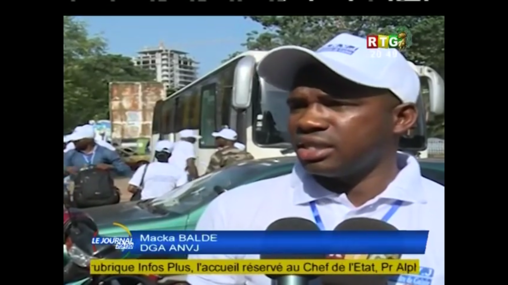 Caravane nationale citoyenne de la jeunesse : l’interview du DGA de l’ANVJ, Macka Balde dans le JT de la RTG (vidéo) Macka Balde DGA de l’agence nationale de volontariat jeunesse ANVJ JT RTG